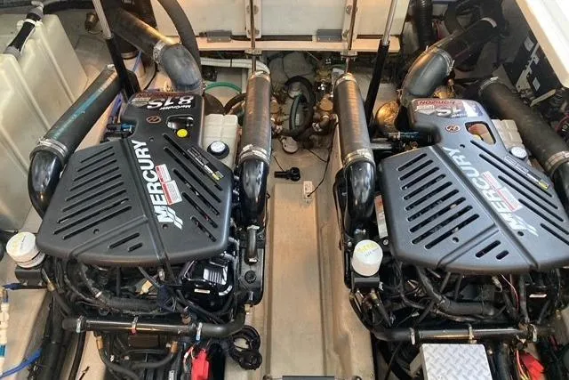 Co-motion Yacht Photos Pics Engine room of 2008 Sea Ray 44 Sundancer with twin Mercury engines.