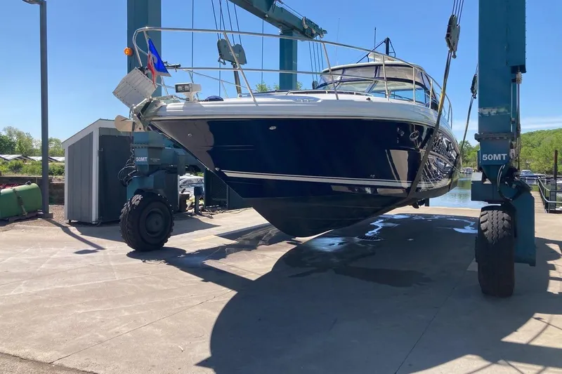 Co-motion Yacht Photos Pics 2008 Sea Ray 44 Sundancer yacht lifted by crane at marina.