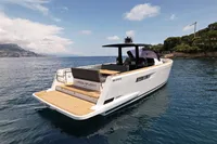 2020 Fjord 40 Open yacht on calm water, featuring sleek design and spacious deck.