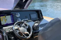 Cockpit of 2020 Fjord 40 Open yacht with navigation equipment and steering wheel.