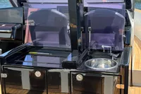 Outdoor kitchen on a 2020 Fjord 40 Open yacht with sink and storage.