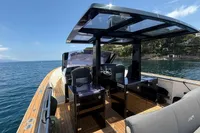 Fjord 40 Open 2020 yacht with sleek design on calm blue waters.