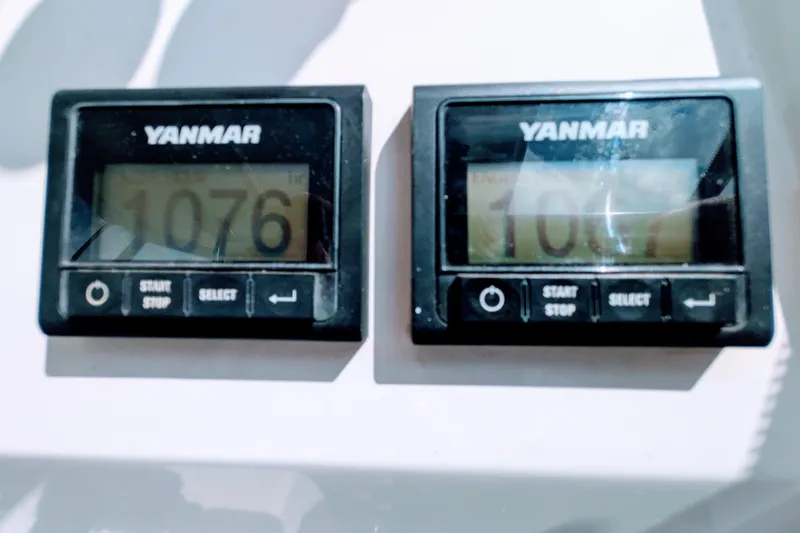 Momentum 42 Yacht Photos Pics Yanmar engine hour meters displaying 1076 and 1067 hours on Leopard 42, 2023 model.