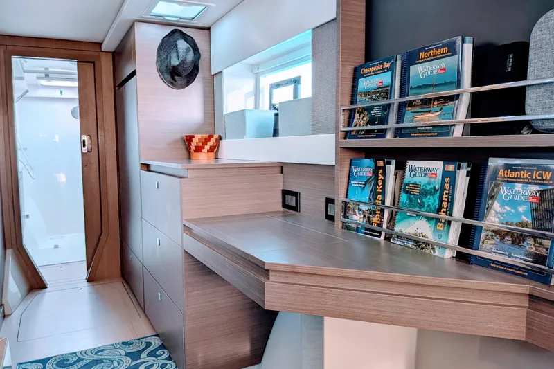 Momentum 42 Yacht Photos Pics Modern Leopard 42 yacht interior with bookshelves, desk, and stylish decor, 2023 model.