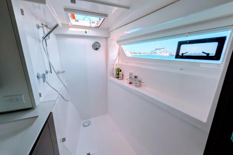 Momentum 42 Yacht Photos Pics Modern bathroom in 2023 Leopard 42 yacht with shower and window view.