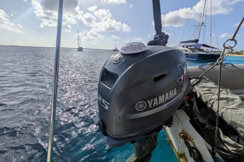Momentum 42 Yacht Photos Pics Yamaha outboard motor on Leopard 42 catamaran, 2023, sailing in sunny waters.
