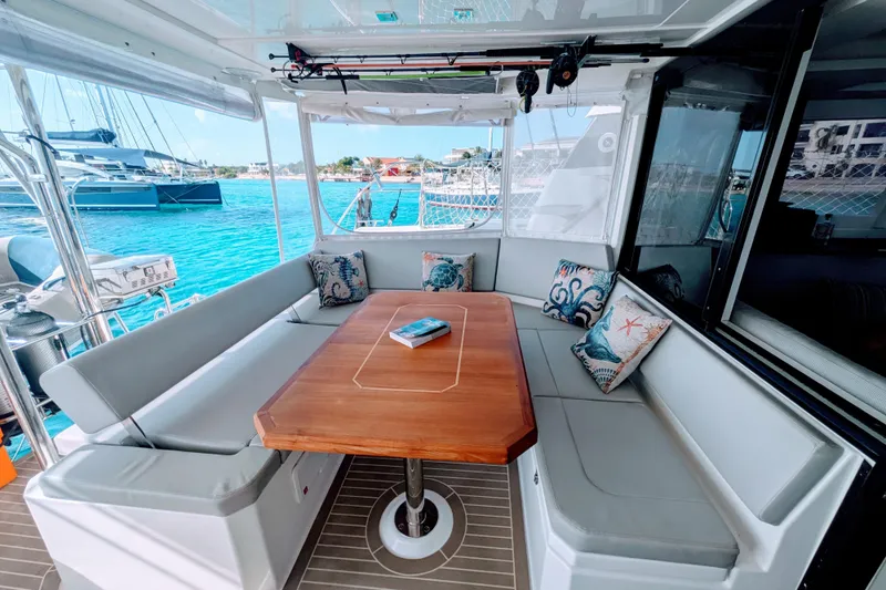 Momentum 42 Yacht Photos Pics Luxurious 2023 Leopard 42 yacht interior with elegant seating and ocean view.