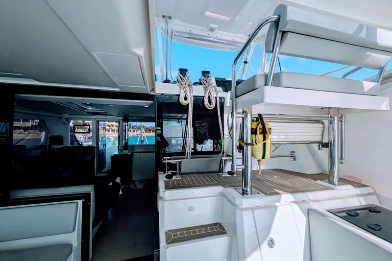 Momentum 42 Yacht Photos Pics 2023 Leopard 42 yacht interior with modern seating and nautical equipment.