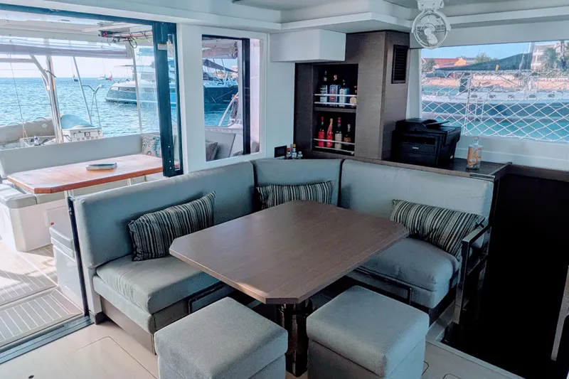 Momentum 42 Yacht Photos Pics Luxurious Leopard 42 yacht interior with dining area, ocean view, and modern amenities, 2023 model.