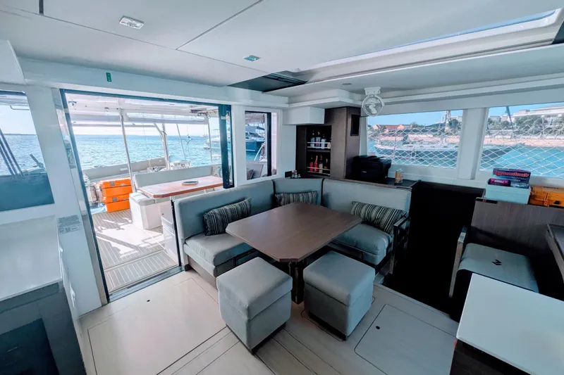 Momentum 42 Yacht Photos Pics Luxurious interior of 2023 Leopard 42 catamaran with ocean view and modern furnishings.