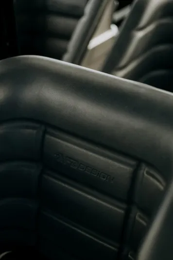 F11 Yacht Photos Pics Close-up of black leather seats in a 2008 FB Design Fabio Buzzi FB 38/19 S.