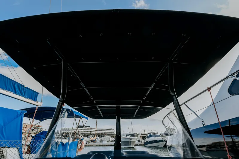 F11 Yacht Photos Pics 2008 FB Design Fabio Buzzi FB 38/19 S boat canopy view at marina.