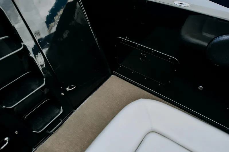 F11 Yacht Photos Pics Interior of 2008 FB Design Fabio Buzzi FB 38/19 S boat, featuring sleek black and beige seating.