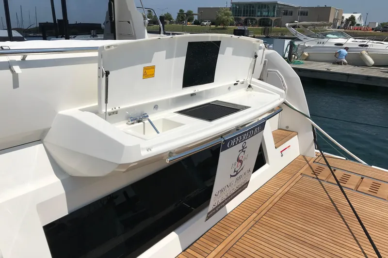 Improbable Yacht Photos Pics Luxury 2019 Prestige 520 yacht with outdoor sink and grill on deck.