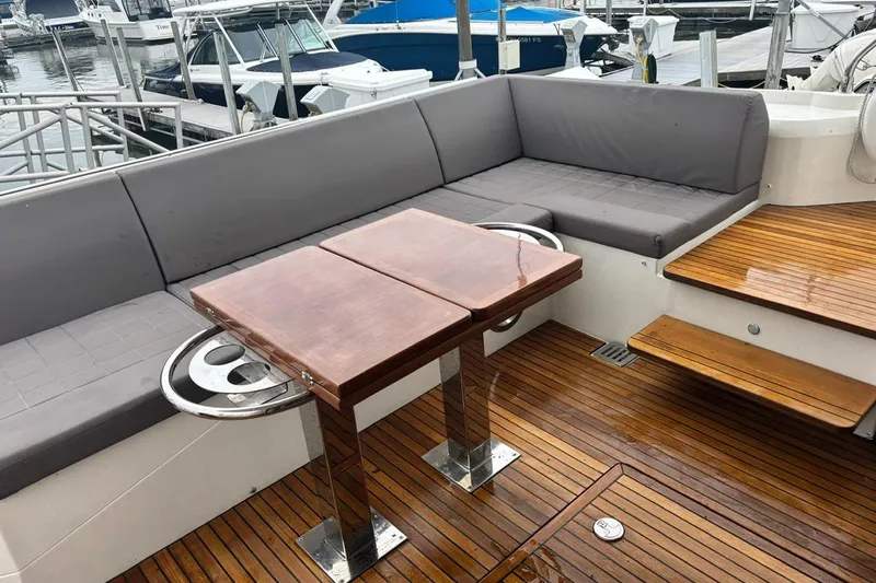 Improbable Yacht Photos Pics Luxurious 2019 Prestige 520 yacht interior with wooden deck and comfortable seating.