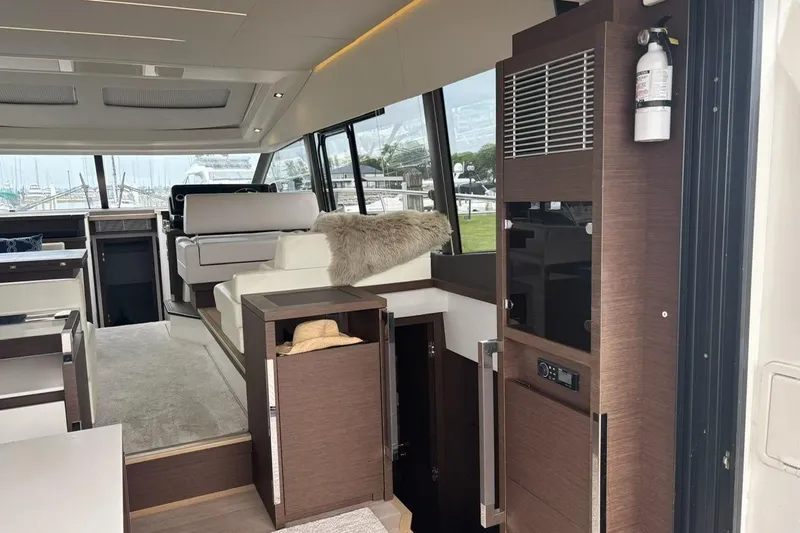 Improbable Yacht Photos Pics Luxurious interior of a 2019 Prestige 520 yacht with modern furnishings and large windows.