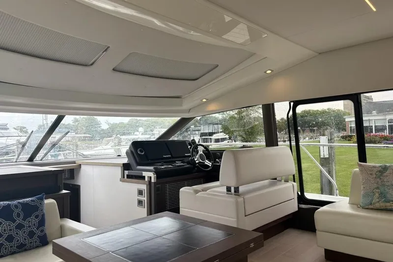 Improbable Yacht Photos Pics Luxurious interior of 2019 Prestige 520 yacht with modern seating and helm station.