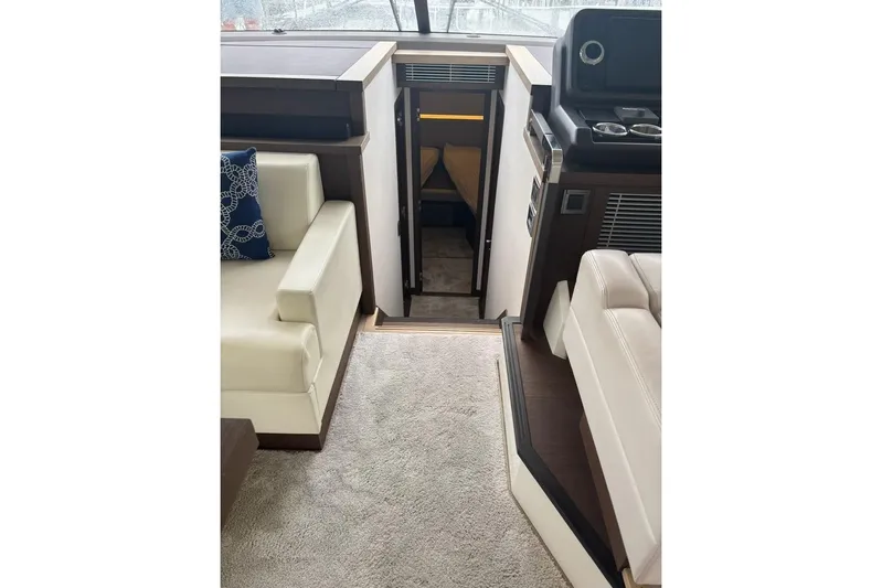 Improbable Yacht Photos Pics Interior of 2019 Prestige 520 yacht, featuring luxurious seating and modern design elements.