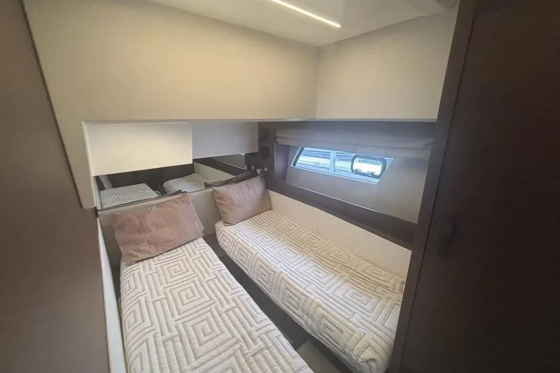 Improbable Yacht Photos Pics Twin beds in a 2019 Prestige 520 yacht cabin with modern decor.