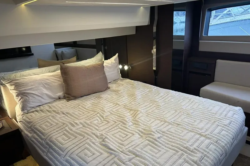 Improbable Yacht Photos Pics Luxurious bedroom interior of 2019 Prestige 520 yacht with modern bedding and ambient lighting.
