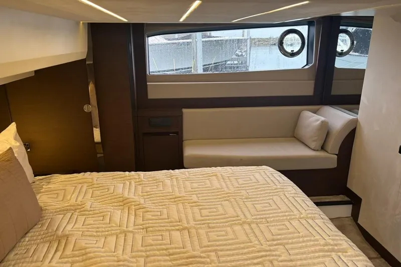 Improbable Yacht Photos Pics Luxurious interior of 2019 Prestige 520 yacht with cozy bed and seating area.