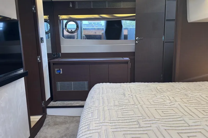 Improbable Yacht Photos Pics Luxurious interior of a 2019 Prestige 520 yacht bedroom with modern furnishings.