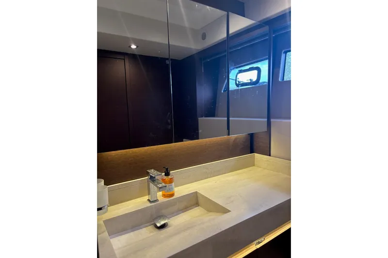 Improbable Yacht Photos Pics Luxurious bathroom in 2019 Prestige 520 yacht with modern sink and mirror.