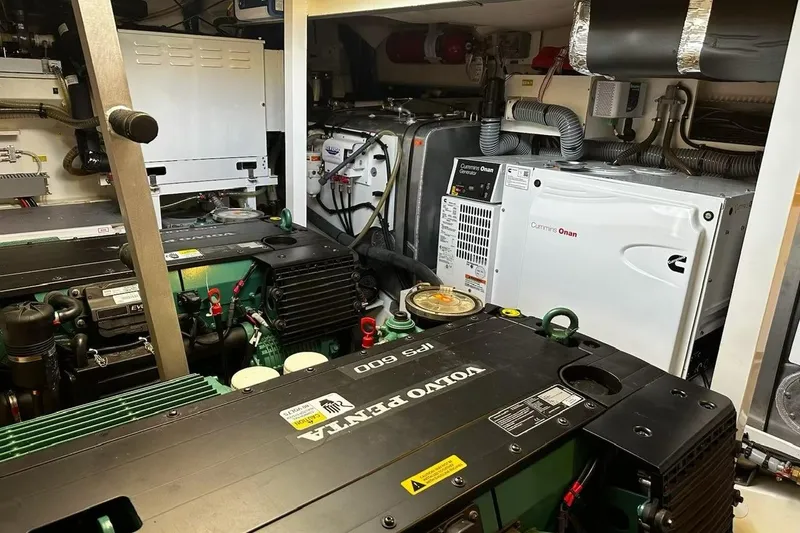 Improbable Yacht Photos Pics Engine room of a 2019 Prestige 520 yacht with Volvo Penta and Cummins Onan systems.