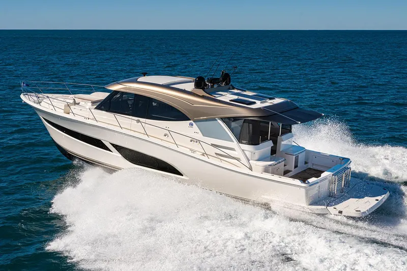  Yacht Photos Pics Manufacturer Provided Image: 2025 Riviera 585 SUV luxury yacht cruising on open water.