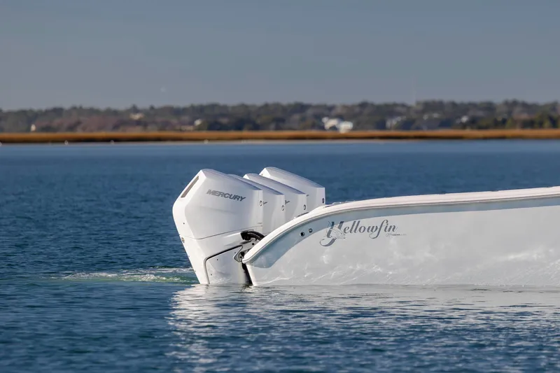  Yacht Photos Pics 2017 Yellowfin 42 Offshore boat with Mercury engines on calm water.