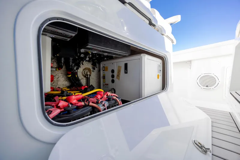  Yacht Photos Pics 2017 Yellowfin 42 Offshore boat electrical compartment with wiring and equipment.