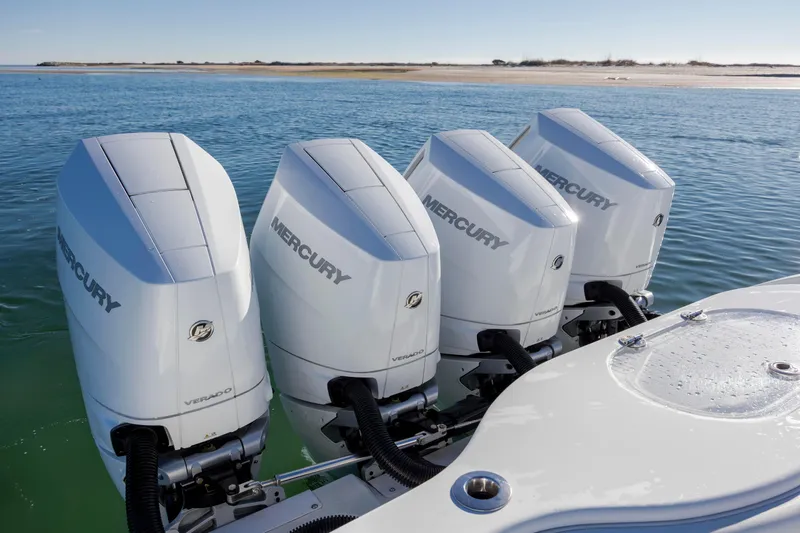  Yacht Photos Pics Four Mercury Verado engines on a 2017 Yellowfin 42 Offshore boat in calm waters.