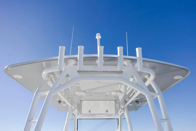  Yacht Photos Pics 2017 Yellowfin 42 Offshore boat top view against clear blue sky.