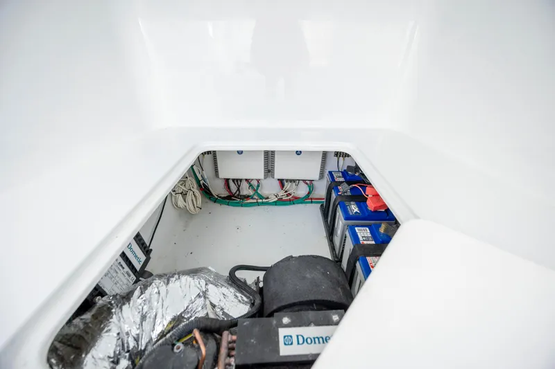 Yacht Photos Pics 2017 Yellowfin 42 Offshore boat interior showing battery compartment and wiring.
