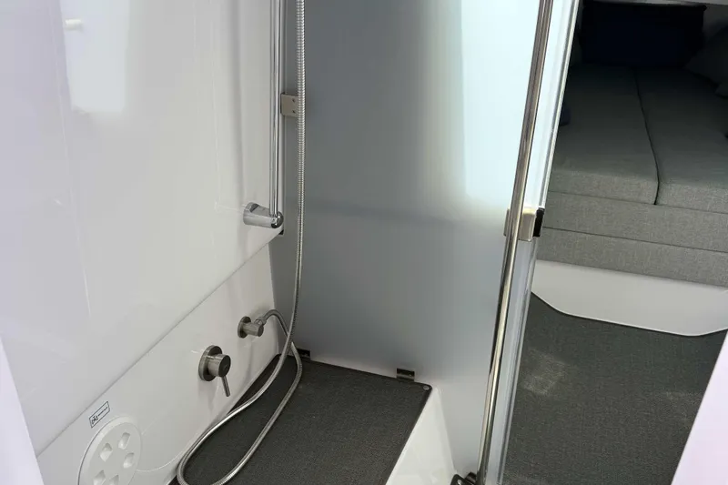  Yacht Photos Pics 2024 Axopar 37 XC CROSS CABIN interior shower and cabin view.