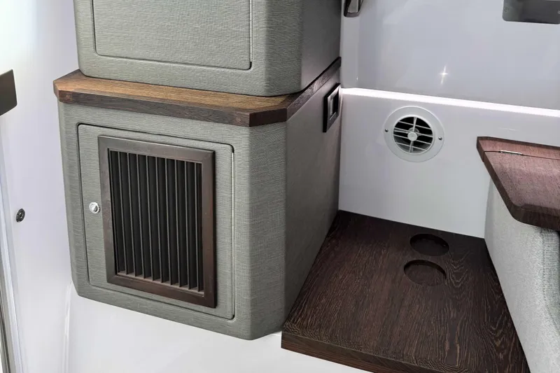  Yacht Photos Pics 2024 Axopar 37 XC CROSS CABIN interior with wood accents and ventilation.