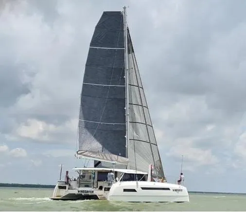 Windsurfer Yacht Photos Pics Custom Max Cruise 44SC 2022 catamaran sailing on a cloudy day.
