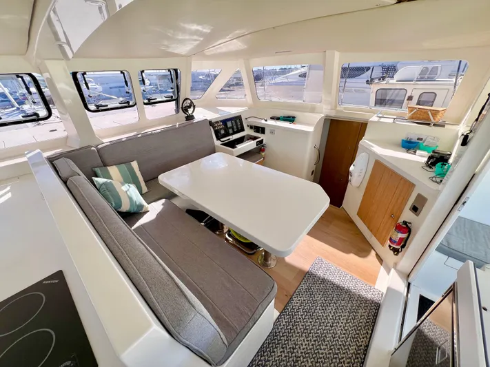 Windsurfer Yacht Photos Pics Interior of 2022 Custom Max Cruise 44SC yacht with modern seating and navigation area.