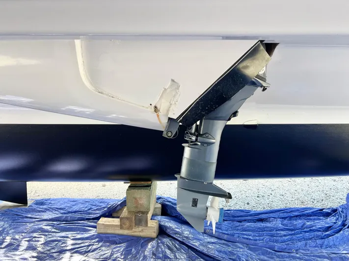 Windsurfer Yacht Photos Pics Max Cruise Marine 44SC 2022 boat hull and propeller on tarp.