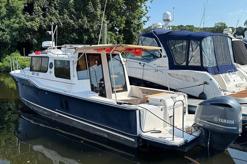  Yacht Photos Pics 2021 Ranger Tugs R-27 boat docked with Yamaha outboard motor.