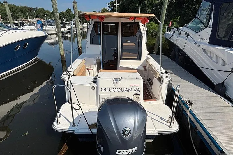  Yacht Photos Pics 2021 Ranger Tugs R-27 boat docked, rear view with Yamaha engine, Occoquan VA.