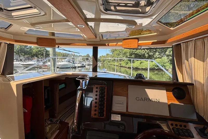  Yacht Photos Pics Interior view of 2021 Ranger Tugs R-27 boat with Garmin navigation system.