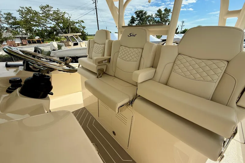  Yacht Photos Pics Luxurious interior of 2026 Scout 400 LXF Li-Ion boat with plush seating.