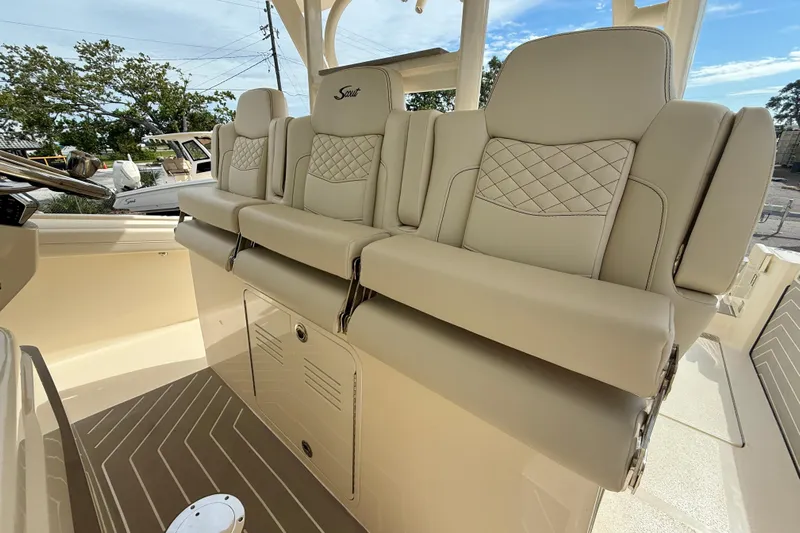  Yacht Photos Pics 2026 Scout 400 LXF Li-Ion boat interior with luxurious beige seating and elegant design.