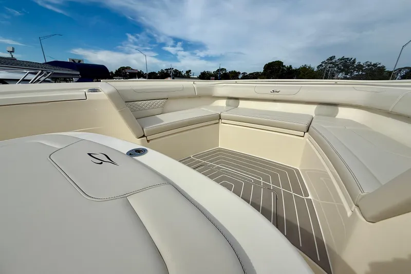  Yacht Photos Pics Luxurious interior of 2026 Scout 400 LXF Li-Ion boat with elegant seating.