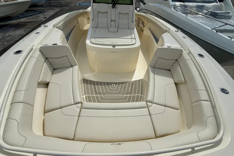  Yacht Photos Pics Luxurious interior of 2026 Scout 400 LXF Li-Ion boat with plush seating.