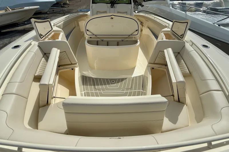  Yacht Photos Pics 2026 Scout 400 LXF Li-Ion boat interior with luxurious seating and storage compartments.