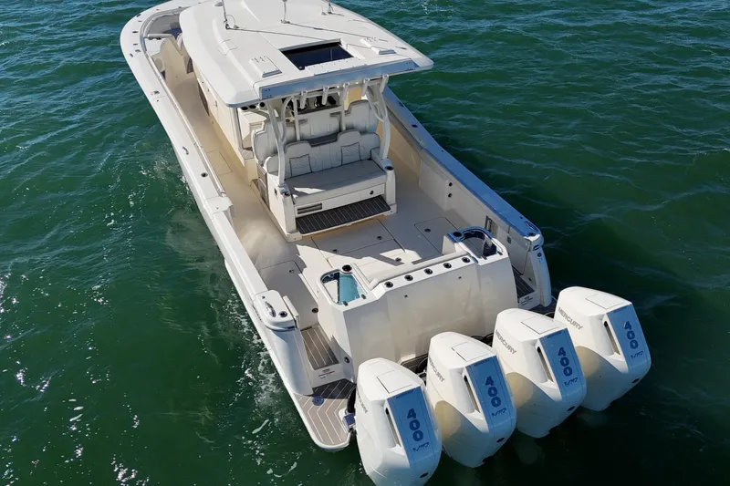  Yacht Photos Pics 2026 Scout 400 LXF Li-Ion boat with four Mercury 400 engines on the water.