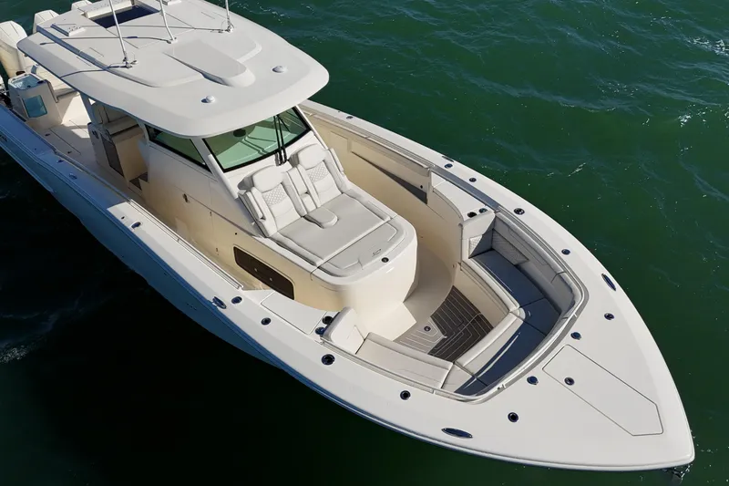  Yacht Photos Pics 2026 Scout 400 LXF Li-Ion boat cruising on open water, showcasing sleek design and luxury features.
