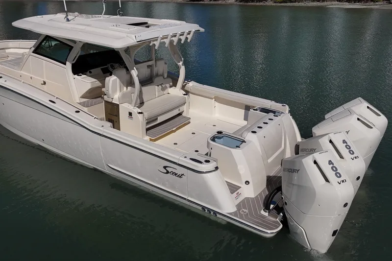  Yacht Photos Pics 2026 Scout 400 LXF Li-Ion boat with Mercury 400 V10 engines on calm water.